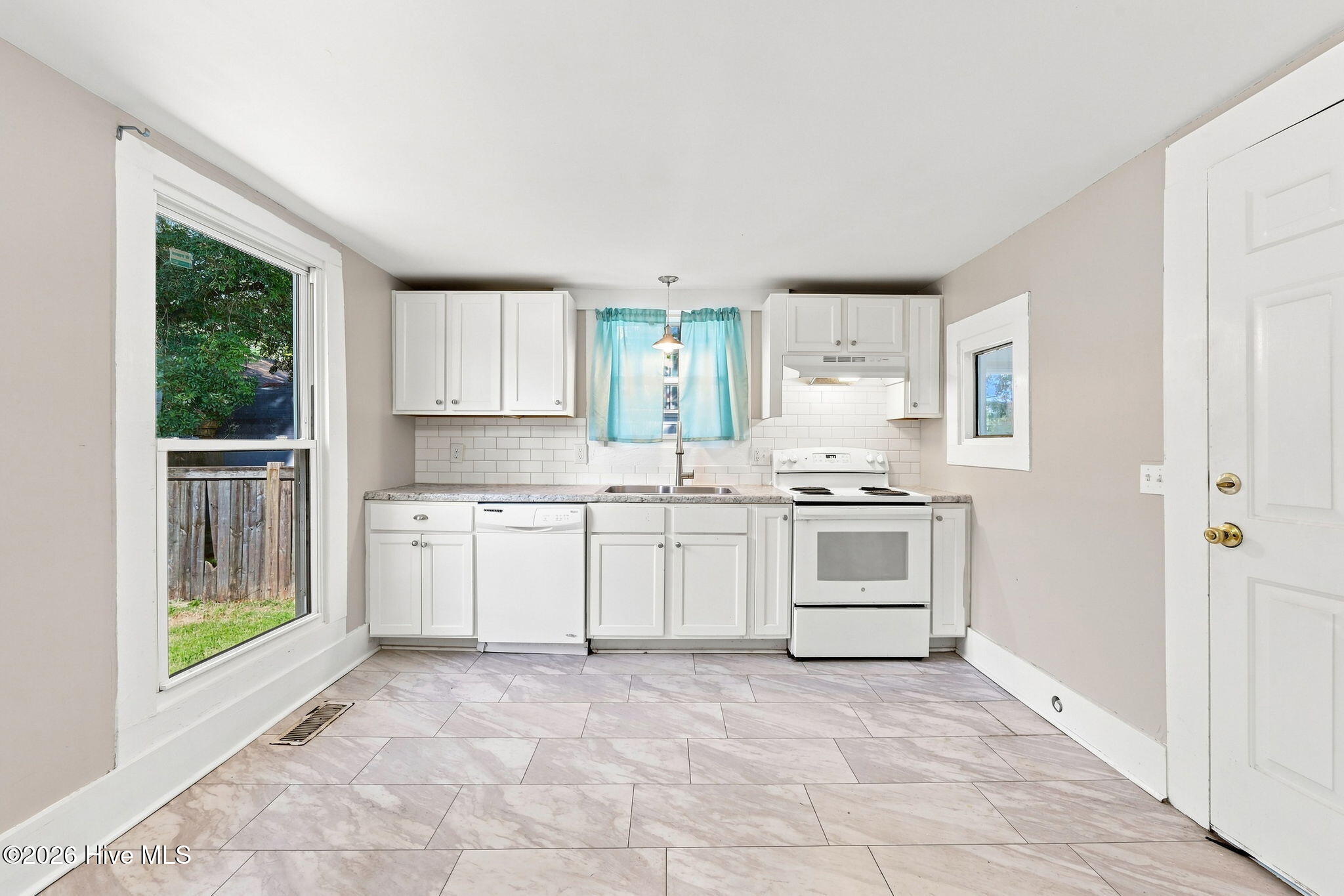 Exterior photo of 411 Latham Street, Greenville, NC 27834. MLS: 100597895