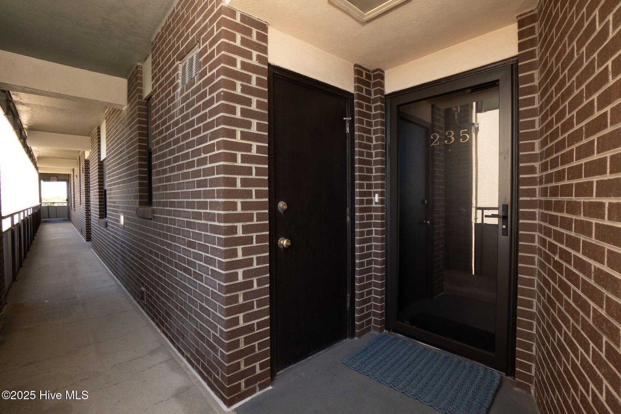 Covered entrance to condo 235