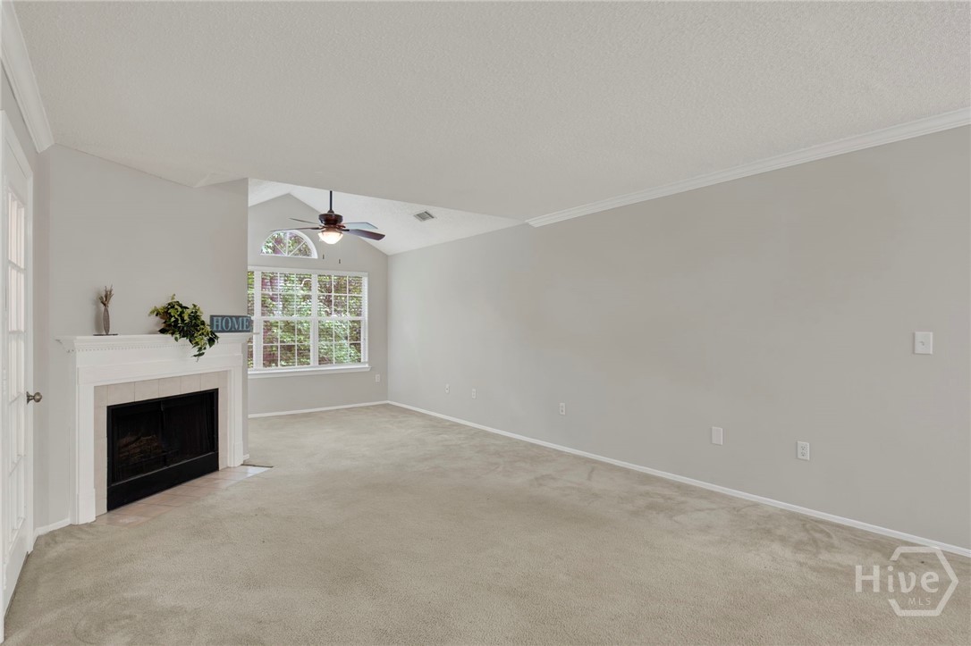 Living room with wood burning fireplace