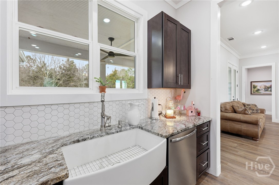 Farmhouse sink & large window overlooking farm