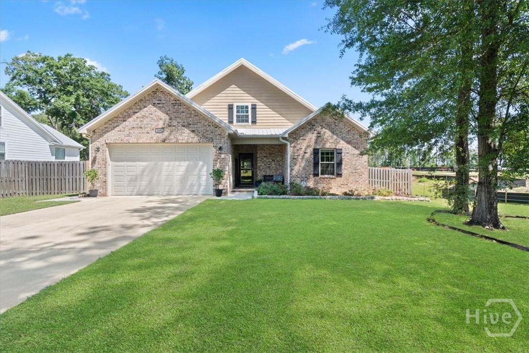 Beautiful, well-maintained home on over 1.5 acres in the heart of Rincon! Enjoy those lazy summer afternoons away from the heat and bugs on the covered and screened patio. A brand new deck is perfect for grilling, entertaining, or simply relaxing while raised garden beds are awaiting your flowers and veggies. Inside is just as impressive with a kitchen anyone could enjoy cooking in and a huge island that is every host's dream. A spacious master suite with huge walk-in shower, a sizable and functional laundry/mud room, and an open living area with a sleek built-in fireplace and shelving are only a few of the many highlights that make this home a must-see!