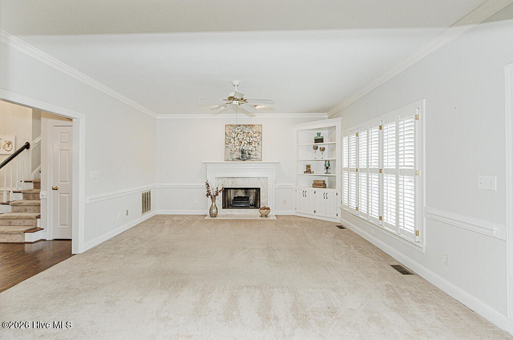 Gas log fireplace and custom built ins!
