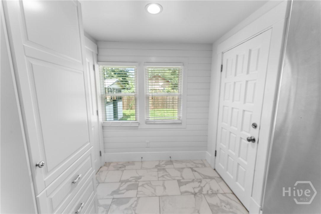 back door with laundry closet