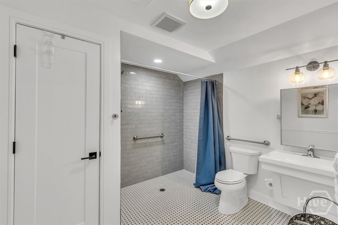 No threshold to shower- perfectly wheelchair accessible.