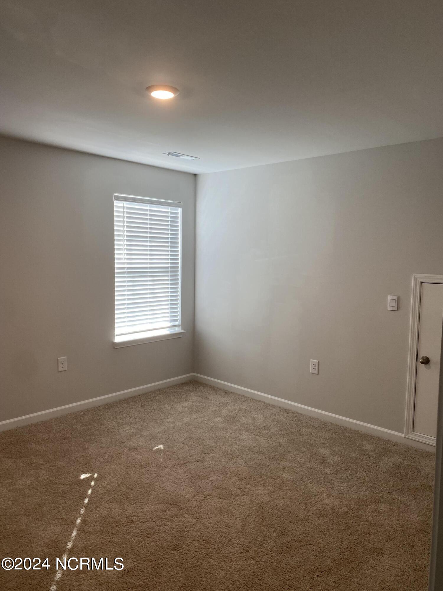 Bedroom 3 upstairs with attic access
