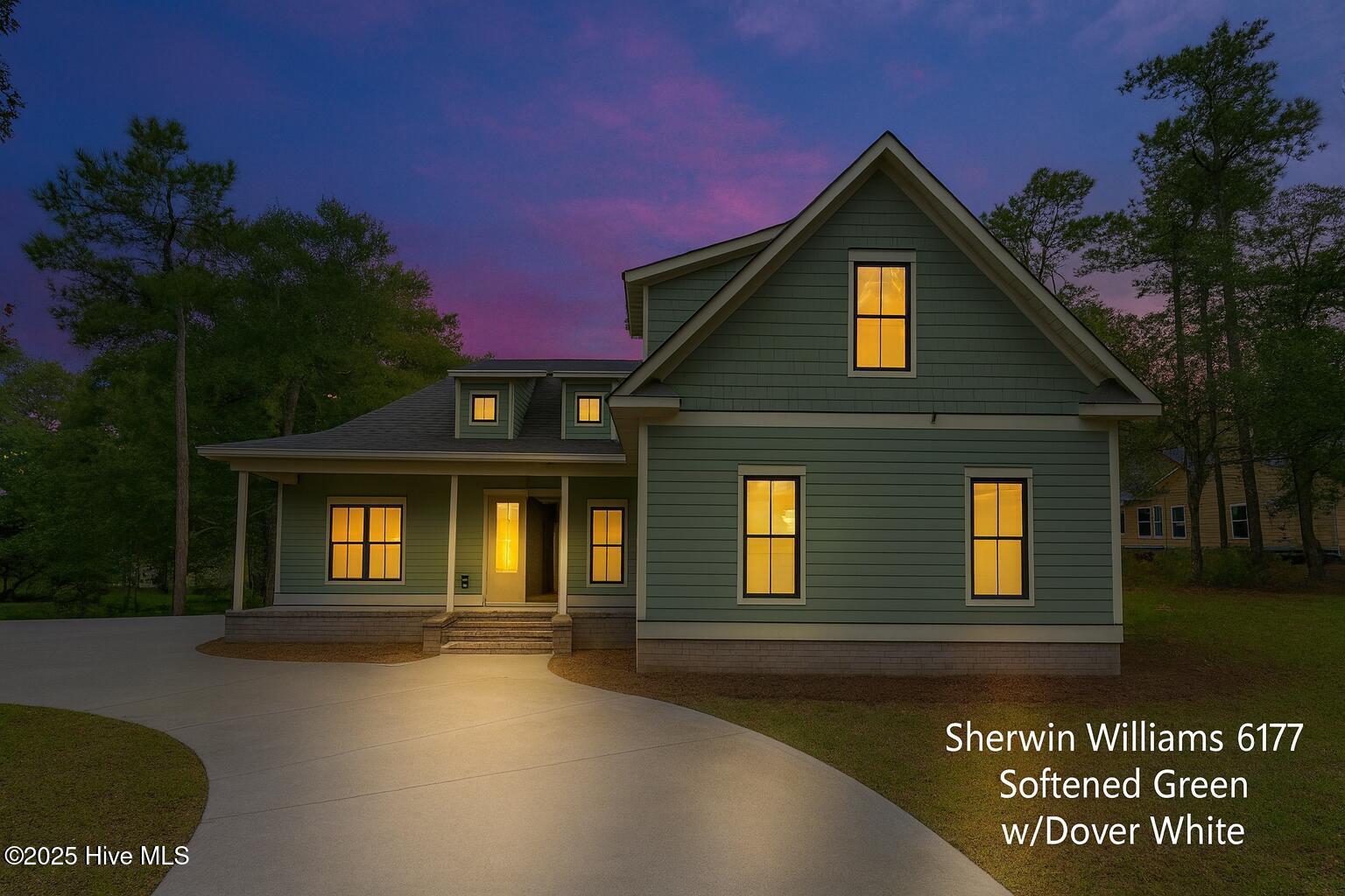 Welcome to The Margret by Coastline Homes—where timeless design meets modern coastal living. Nestled on a premium pond view homesite in the sought-after gated community of Oyster Harbour in Supply, NC- minutes from Holden Beach, this elegant new construction home offers serene pond views and thoughtfully curated details throughout. Boasting 2,499 heated square feet of beautifully appointed living space, this 3-bedroom, 3- full bath + powder room home includes a flexible bonus room upstairs and outdoor living between the covered front porch and screened back porch.
Step inside and immediately feel the difference with 10-foot ceilings, 8-foot interior doors and striking black-trimmed energy-efficient windows that add style and dramatic contrast. The open-concept living area features custom trim, designer lighting, and a cozy fireplace with built-ins. 
The gourmet kitchen is a showstopper—complete with 42'' cabinetry, quartz countertops, Frigidaire Gallery stainless steel appliances 36'' gas cooktop, and oversized island perfect for entertaining.
The owner's suite is a private retreat with a spa-style bath featuring a tiled walk-in shower with dual shower heads, double vanities, and a generous walk-in closet. Guest bedrooms are thoughtfully placed for privacy, and the upstairs bonus room with full bath offers the perfect space for a home office, media room, or guest suite. The Margret spotlights a Ranaii tankless water heaters, 3 HVAC zones, Epoxy garage floor, a security system and built in Bluetooth speakers in living room and screened porch. Enjoy peaceful evenings on the screened porch overlooking the pond, or take a stroll through the neighborhood's wooded trails and amenities, including clubhouse, pool, fitness center, tennis, kayak launch, and boat ramp to the Intracoastal Waterway.