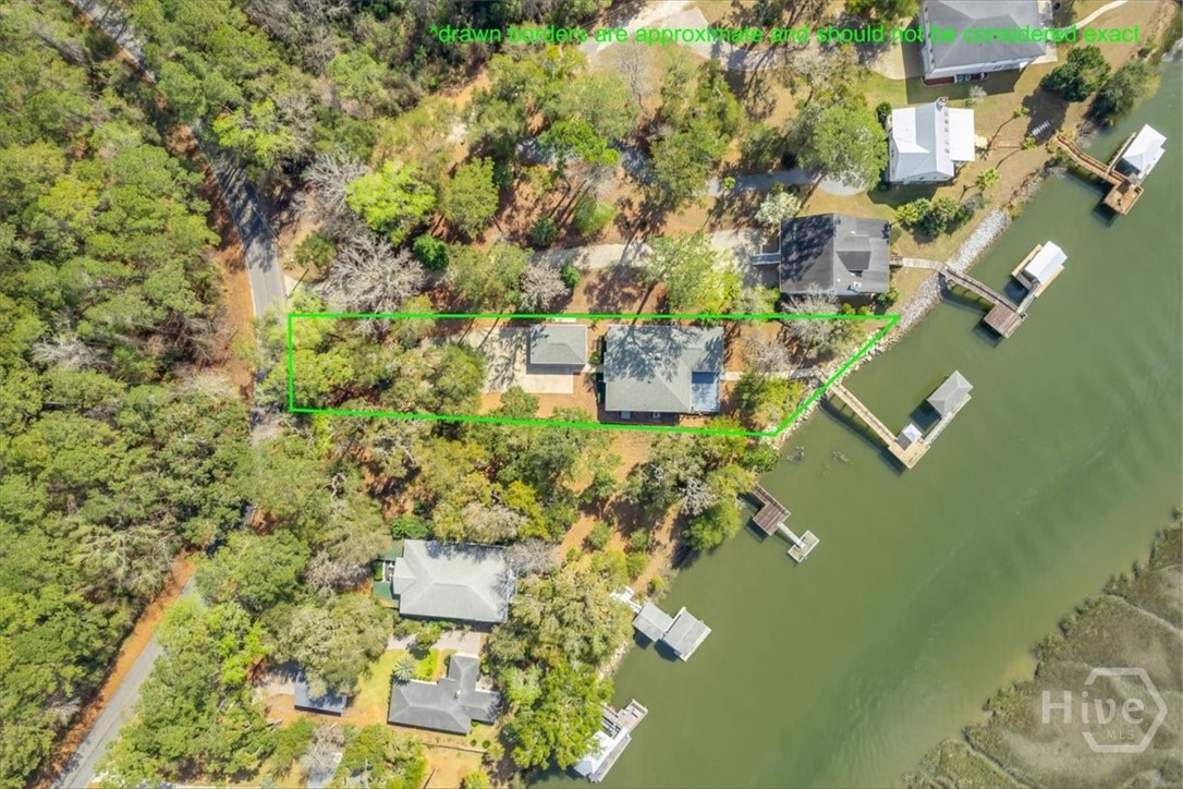 Dock, House and Carport in outlined in Green