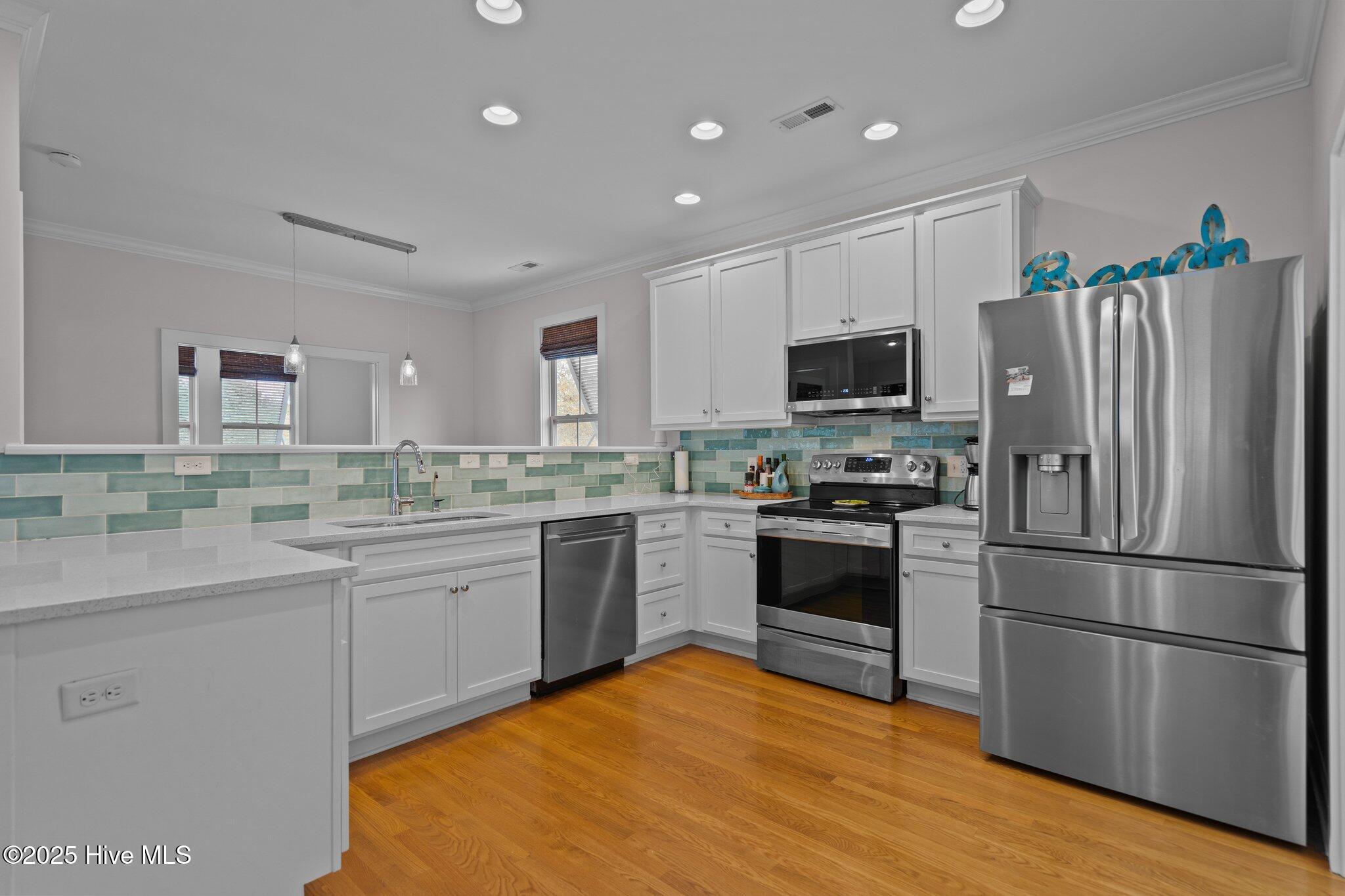 418 Columbia Avenue, Carolina Beach, NC 28428 – photo 9: 28-web-or-mls-DSC03845