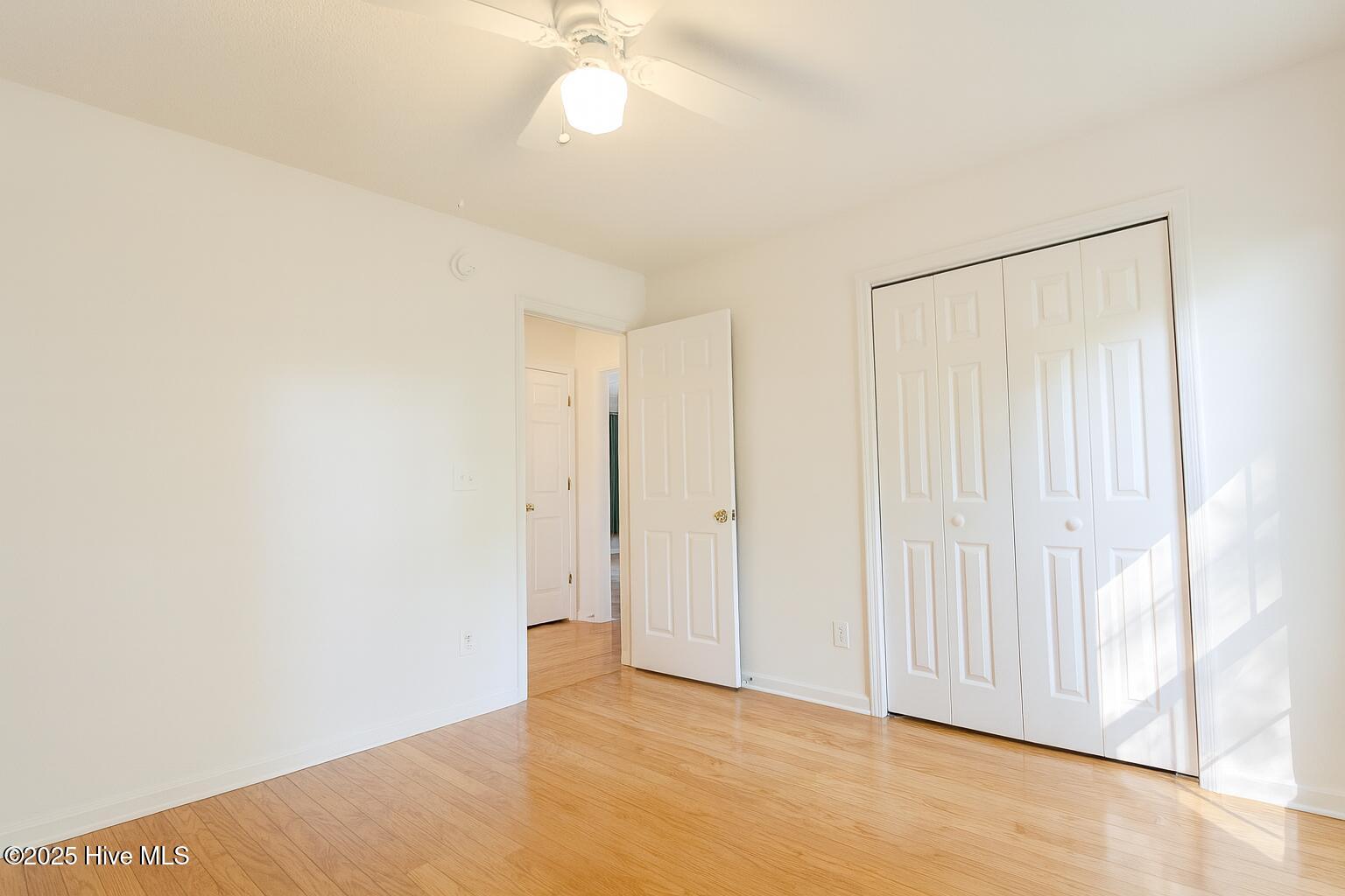 9117 Landing Drive SW, Calabash, NC 28467 – photo 19: Bright and Spacious Bedroom Interior