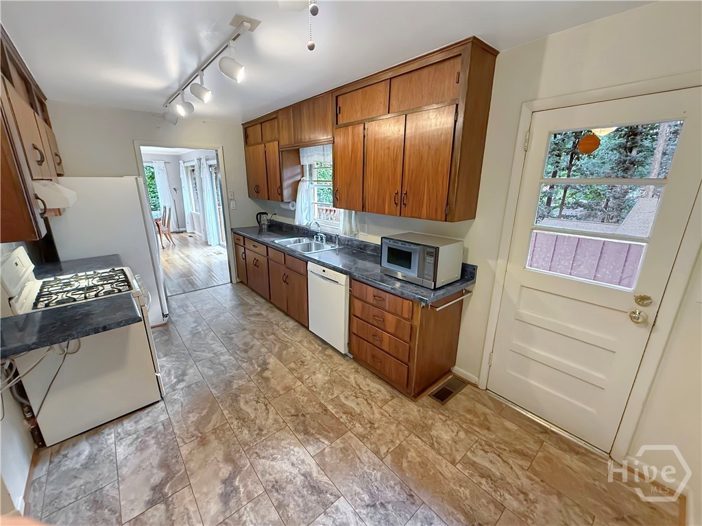 Upper Level Kitchen w/door to the back deck