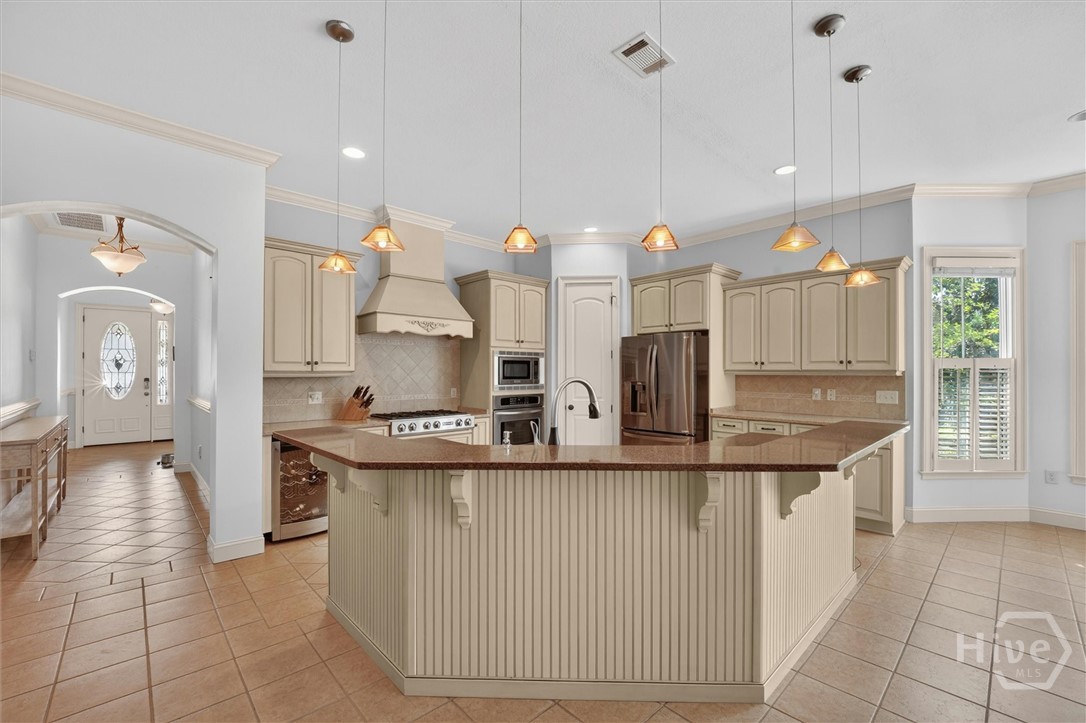Gourmet kitchen with room for 4-6 bar height chairs