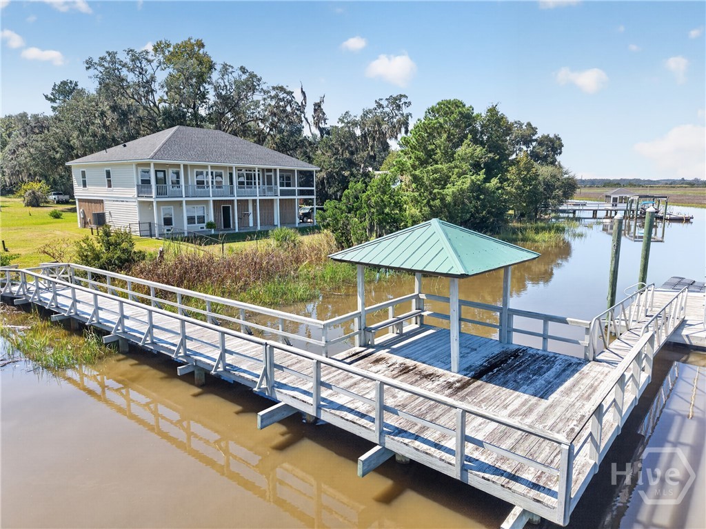 Call to view this home and begin your Coastal Georgia lifestyle.