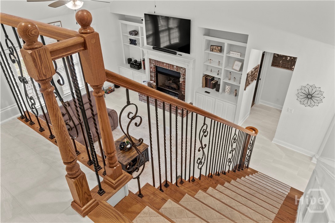 looking down stairs from loft - 4 Bedrooms upstairs