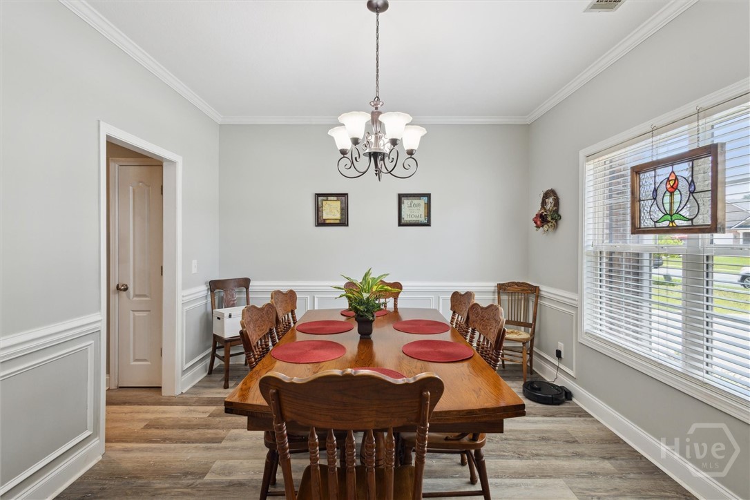 Immediately on the right is a large formal dining