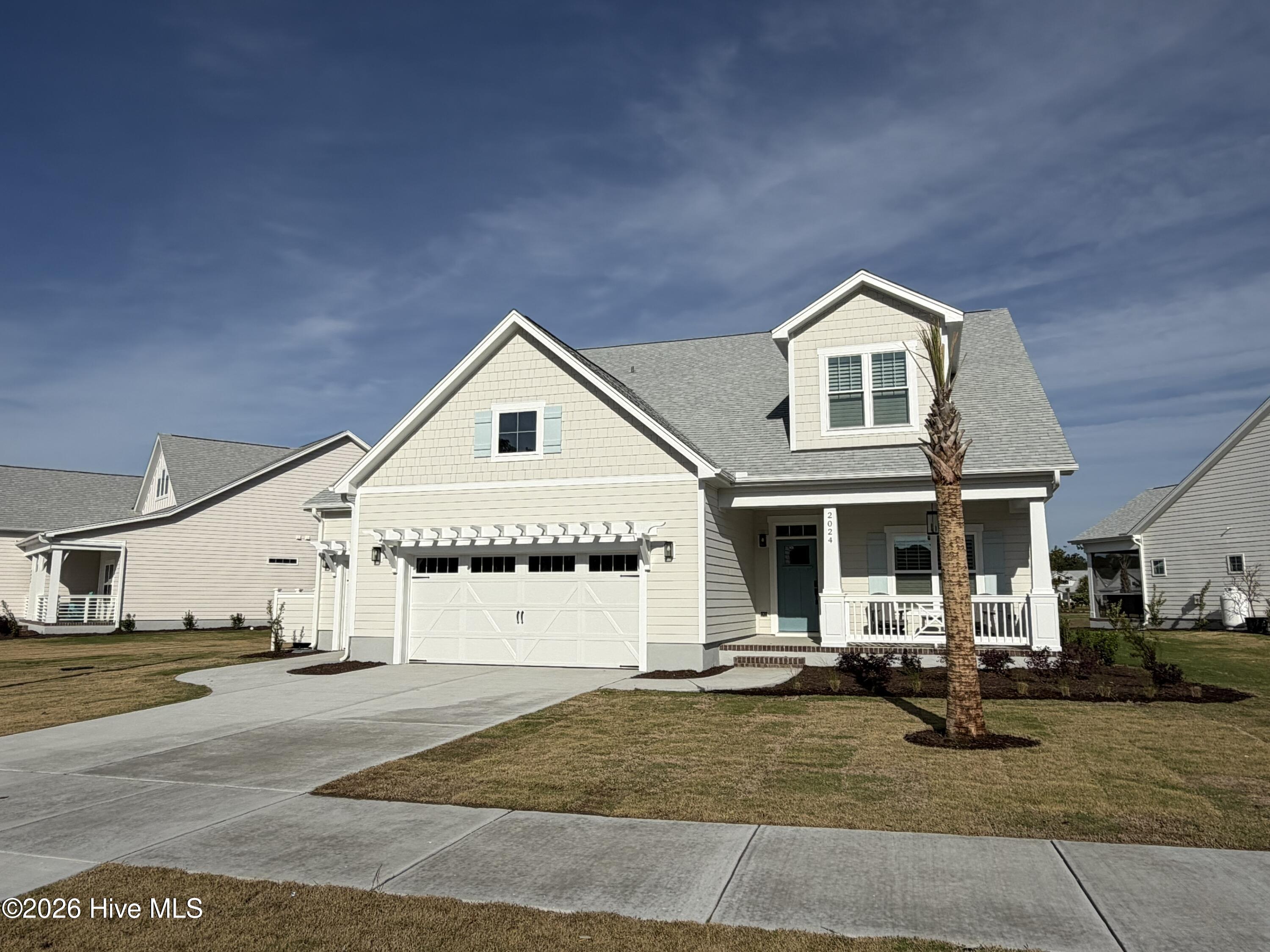 2024 Scup Place, Sunset Beach, NC 28468 – photo 1 of 1: Front of Home