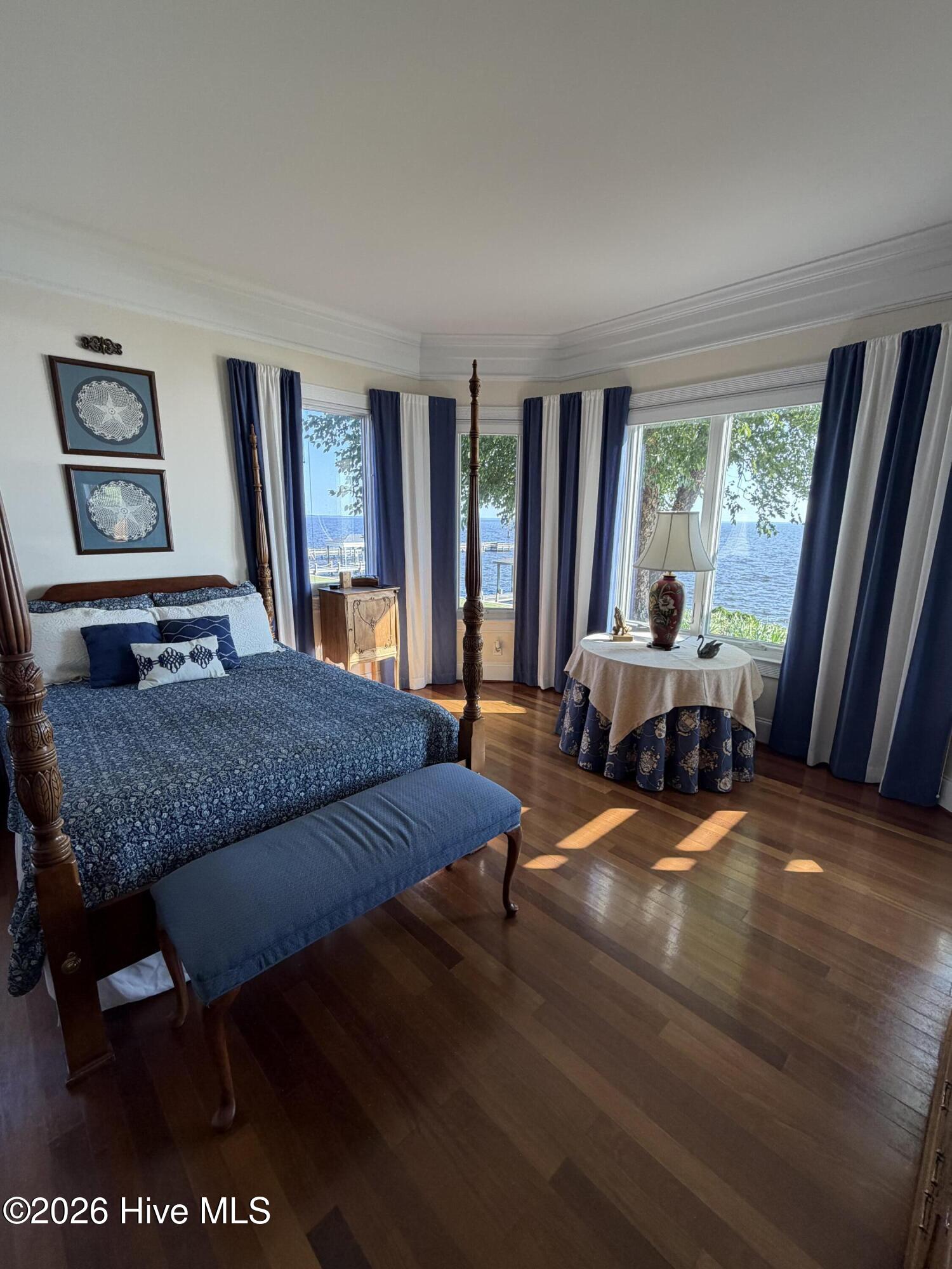 Downstairs Master. This is a huge suite. More photos coming soon to show the rest of the bedroom/bathrom suite.