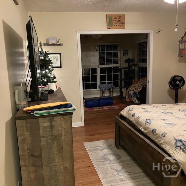 Master bedroom with view to sunroom