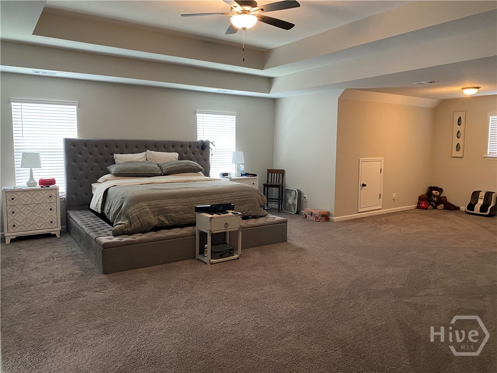 Primary bedroom with view of sitting area