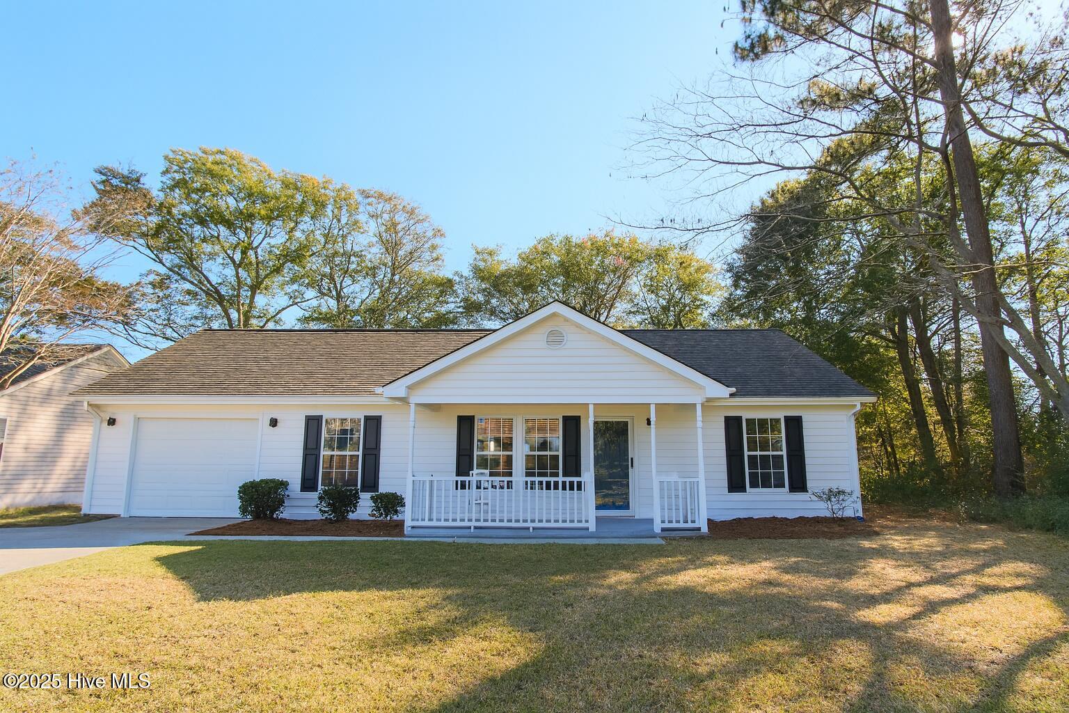 9117 Landing Drive SW, Calabash, NC 28467 – photo 8: Suburban Ranch-Style Home in Afternoon L