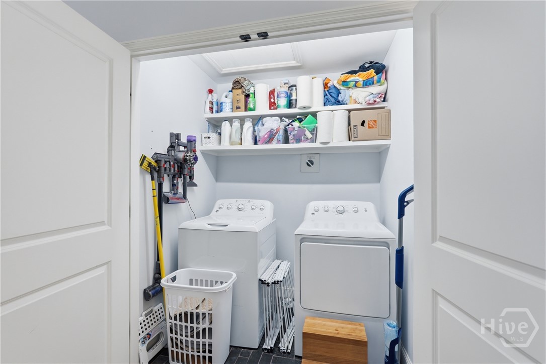 laundry room next to half bath