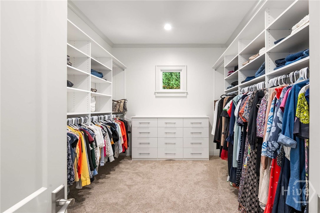 1 of 2 closets for primary bedroom on main