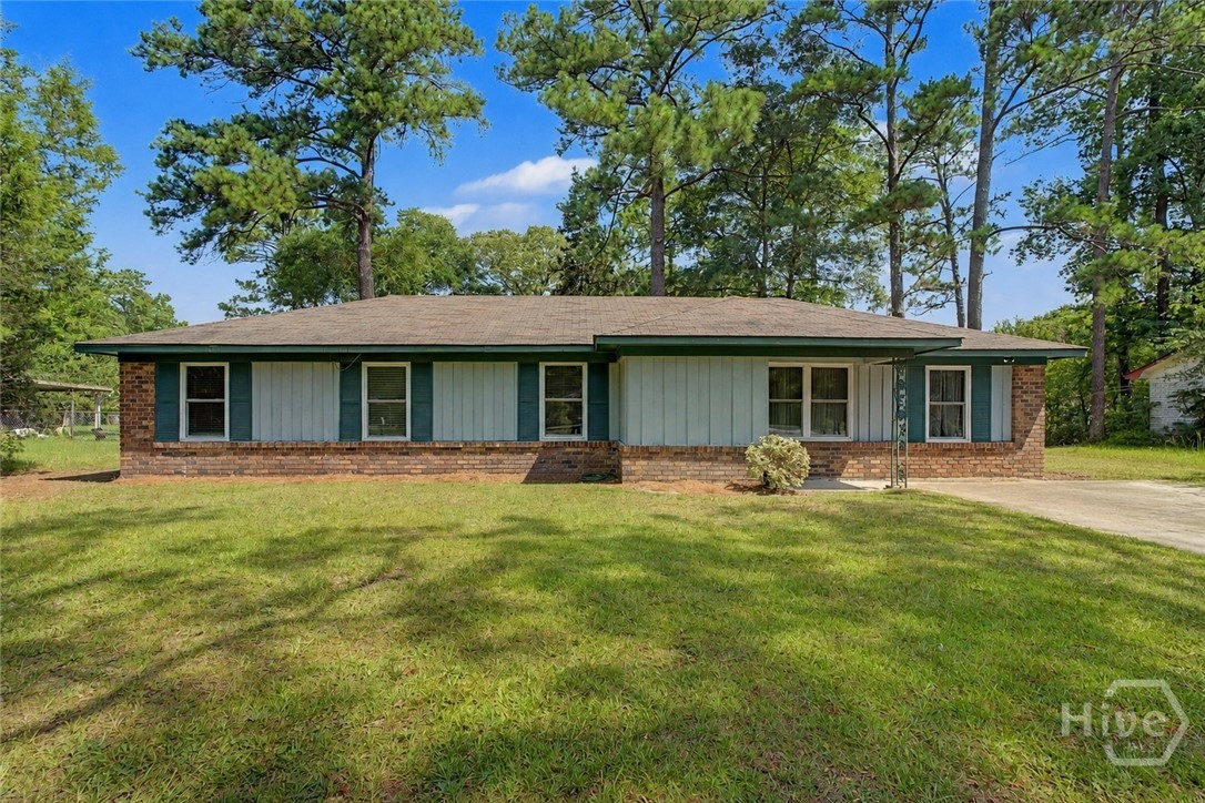 Welcome home to this well-kept three-bedroom property offering comfortable living space, practical updates, and an exceptionally spacious backyard. Laminate flooring adds easy-care appeal throughout the home, while the renovated full bathroom brings a fresh, updated feel. The kitchen has also received thoughtful improvements, creating a functional space for everyday meals and gathering.The primary bedroom includes a private half bath and a generously sized walk-in closet, providing storage that is hard to find in a home of this size. Two additional bedrooms offer flexibility for guests, a home office, or hobby space. HVAC system was replaced in 2025 and the roof is 7 years old. Outside, the large fenced yard provides plenty of room for pets, play, gardening, or future outdoor projects. A covered patio just off the back of the home creates a comfortable spot for grilling, entertaining, or relaxing in the shade. With its flexible layout, useful updates, and standout outdoor space, this home is ready for its next owner to make it their own.
