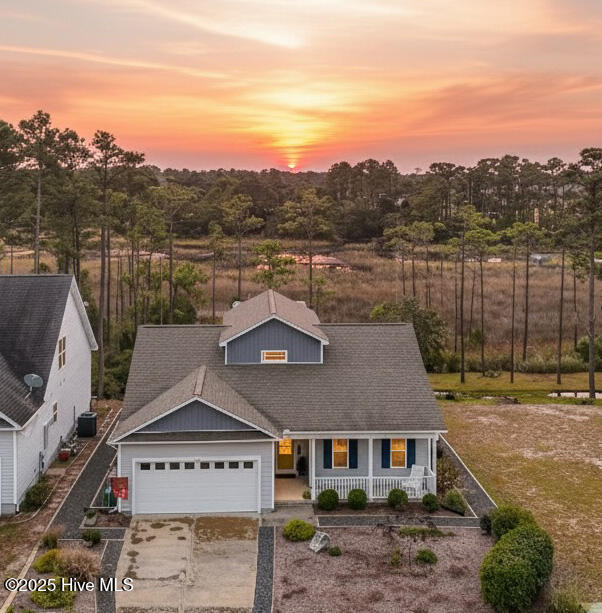4986 N Hampton Drive SE, Southport, NC 28461 – photo 2: 4986NHamptonDrSEsun - at sunset