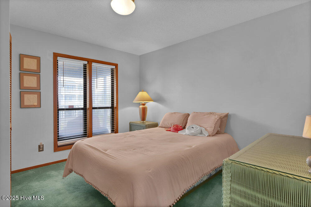 308 N Shore Drive E, Sunset Beach, NC 28468 – photo 16: Primary Bedroom