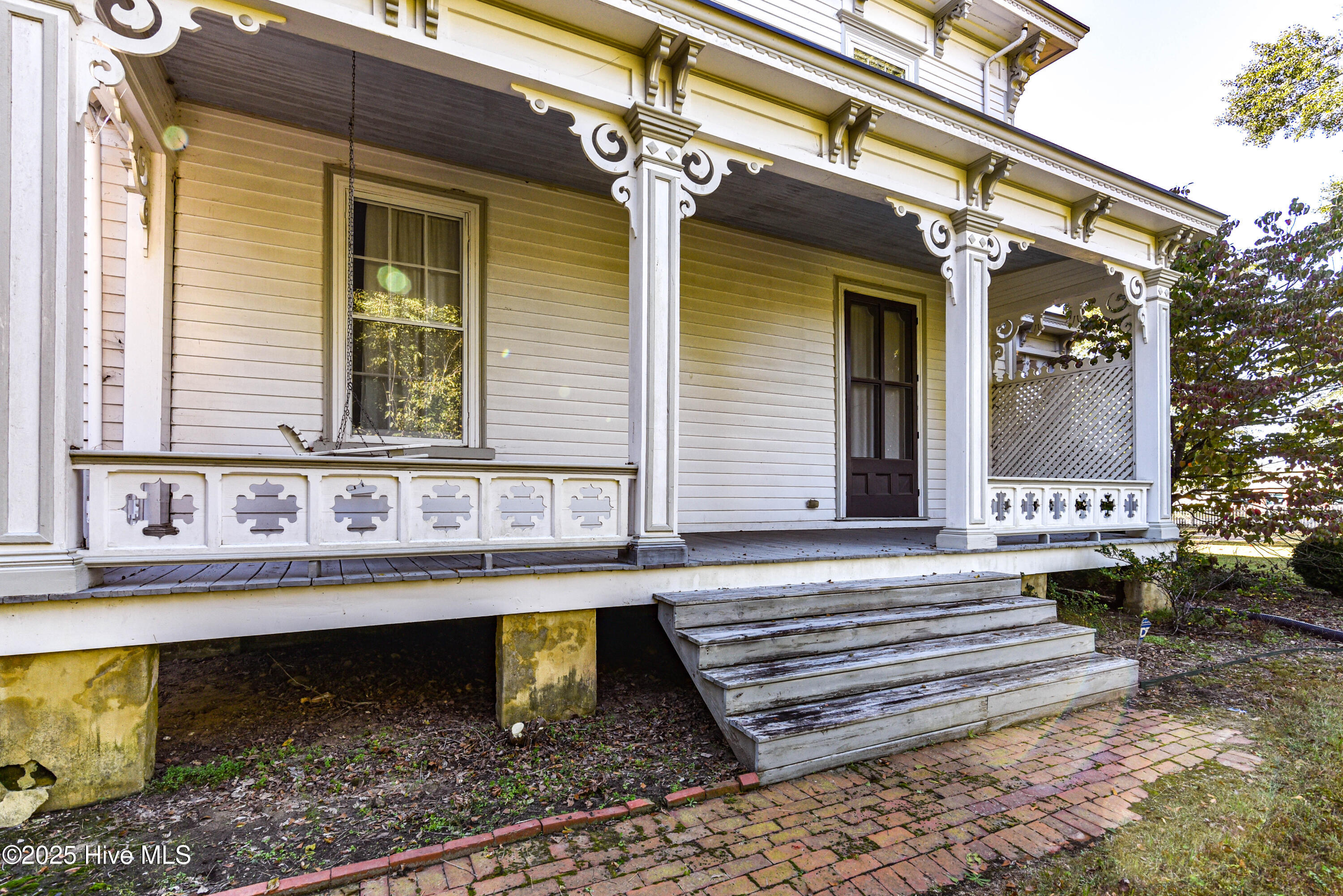 Left porch as seen in the photo from the early 1900s with the original owners.