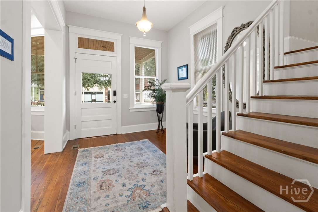 Foyer with beautiful hardwood floors