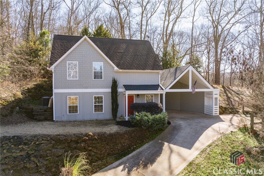 This 2 bedroom 2 bathroom in-town Athens home sits on an elevated lot at the end of a quiet cul de sac, offering a private and serene setting. The wooded backyard borders park acreage providing high-elevation views of Downtown, the Oconee River, & Greenway Trails. Within several blocks of several in-town parks and a short straight shot up Broad Street to the UGA Arches and North Campus, it offers unparalleled proximity to the heart of In-town Athens. Seller is offering a temporary buydown with an accepted offer.