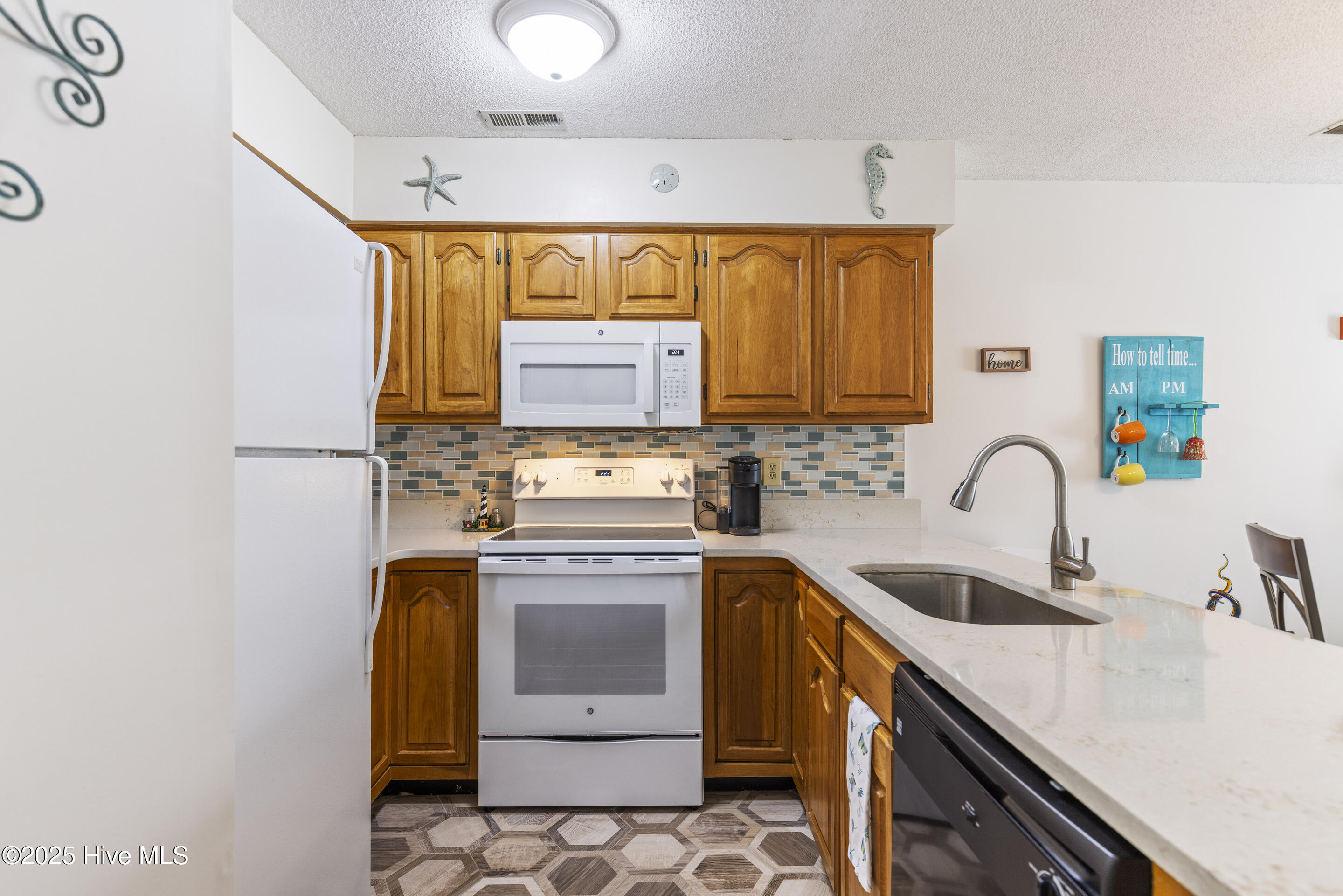 1908 Goose Creek Road SW Unit 1202, Ocean Isle Beach, NC 28469 – photo 24: Kitchen