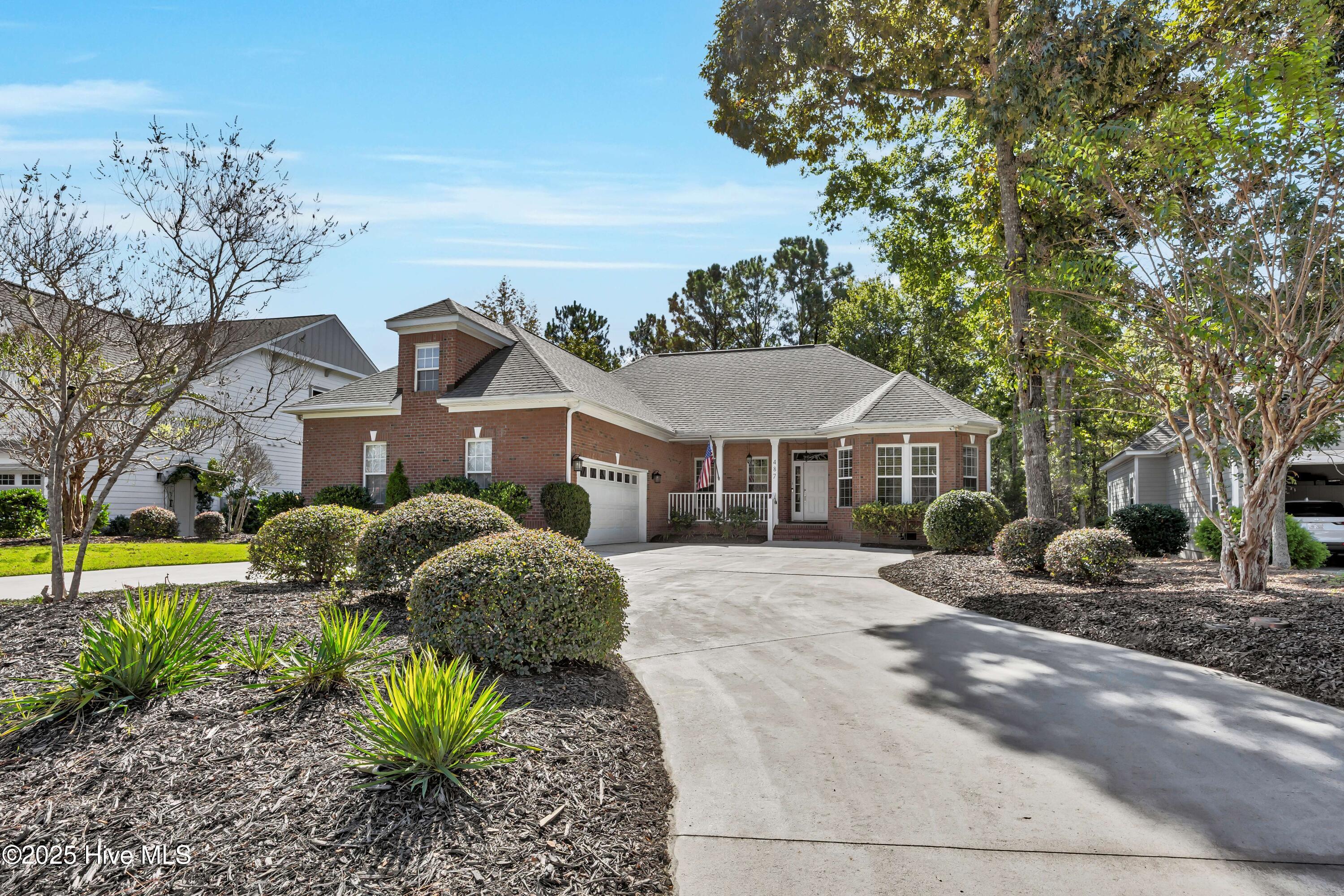PRICE IMPROVEMENT!  Nestled in a tranquil neighborhood, this charming brick home offers a blend of modern updates and classic appeal. The roof, installed in 2023, ensures durability and peace of mind for years to come. Additionally, the encapsulated crawl space, equipped with a dehumidifier, adds an extra layer of protection against moisture.Inside, the freshly painted laundry room and garage create a crisp, clean environment. The open floor plan seamlessly connects each space, leading to a bright and cheery sunroom that invites an abundance of natural light.  French drain installed in back yard 2025. Extra large garage.Whether you are seeking comfort, convenience, or a touch of elegance, this home provides it all in one delightful package.   Winding River's unparalleled amenities include an ocean front beach club w/pool in Holden Beach, clubhouse w/pool and pavilion, fitness center, River House w/marina, Marina on ICW in Holden Beach, tennis/pickleball, bocce, walking trails. Carolina National Golf Course a 27 hole golf course designed by Fred Couples winds throughout the community.