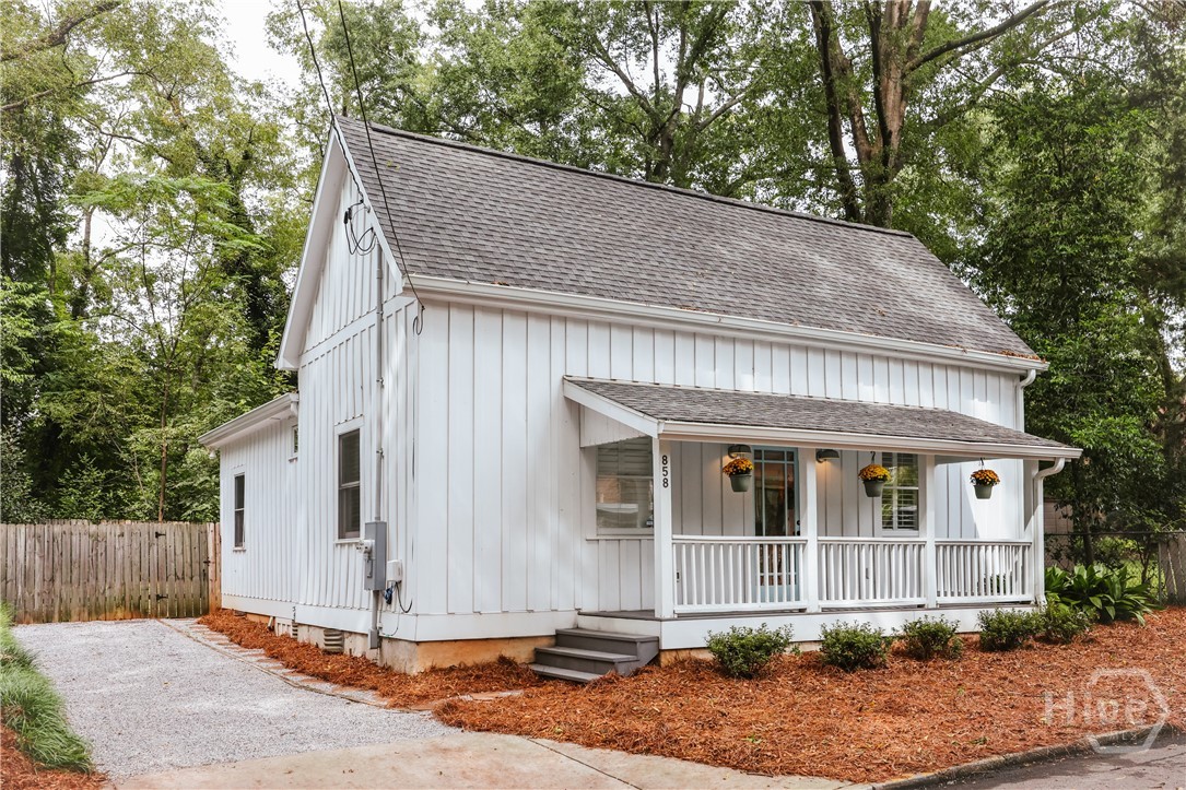 Welcome to 858 Meigs Street in the highly desirable historic neighborhood of Cobbham in Athens, Georgia. This eye-catching 1930s one-and-a-half story cottage has been completely renovated offering 2 BR 2 BA and a great additional flex space upstairs. Entering the home there's a soaring cathedral ceiling with skylight. Spacious living and dining area flows into a stylish updated kitchen. Quartz countertops, gas stove, custom cabinetry and lots of work space with storage here. Laundry room near by. Primary bedroom front facing with ensuite tiled step-in shower. Second bedroom back of house with hall bathroom. Upstairs loft space could be used for an office, media room, playroom, art studio or yoga space. Plenty of closet spaces. Covered back deck area is perfect. Fenced back yard. This home's interior has just been painted and the lot landscaped. This charming property is just minutes from the Prince Avenue corridor, downtown Athens as well as The University of Georgia campuses.