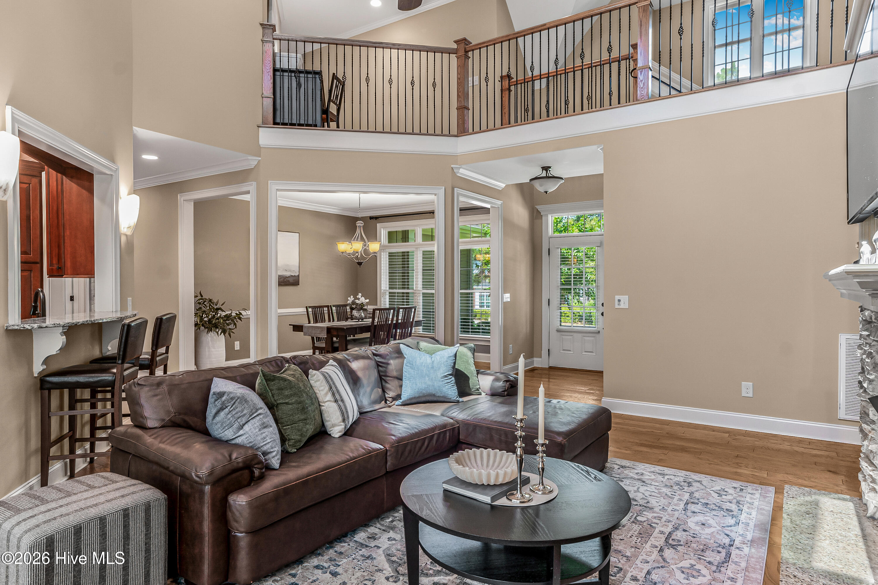 Warm wood floors coupled with tall legs. (Ceilings)