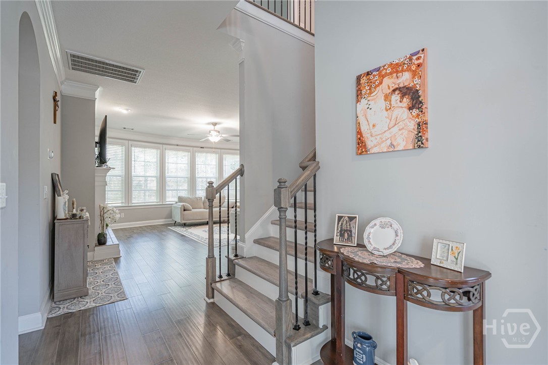 Foyer going towards stairs and Family Room