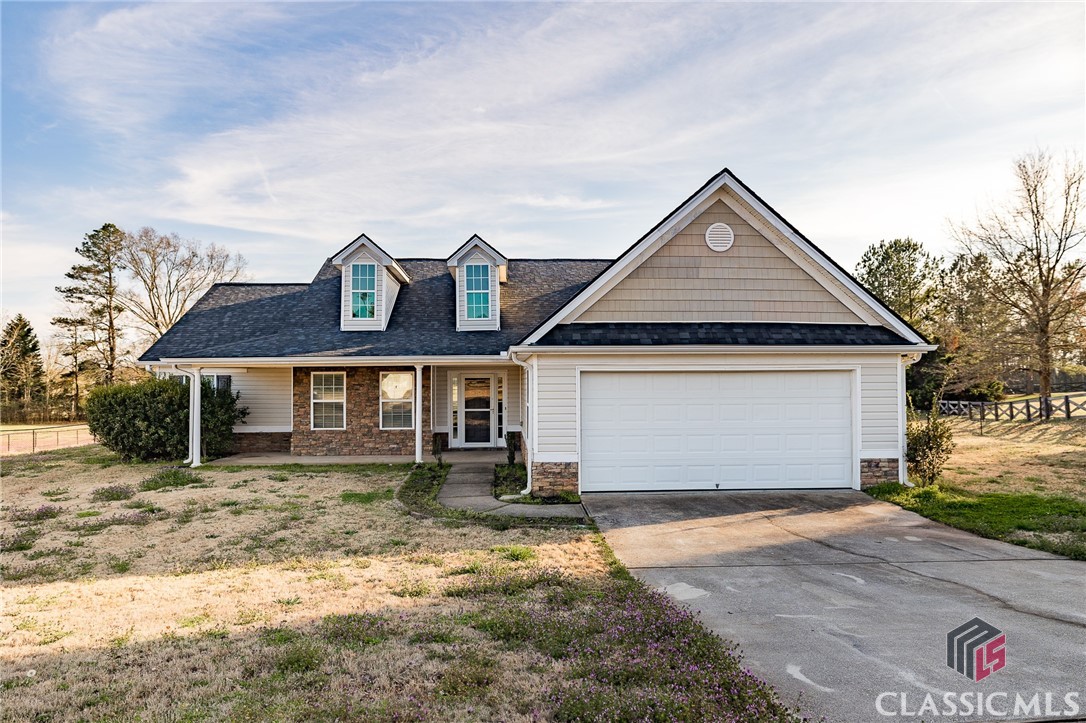 Experience the charm of Morgan County living in this 3 bedroom/2 bath residence nestled on a generous 1.13-acre lot within the sought-after Fields of Madison neighborhood. Located just 3 miles from downtown Madison and I20. Inside, enjoy fresh flooring in the living area, a split bedroom floor plan, and a brand new HVAC unit. The primary bedroom features a cozy sitting room, and outside, you'll find a large, open backyard perfect for outdoor fun. With a 2.5 year old roof, this home is ready for you to move in and make it yours!