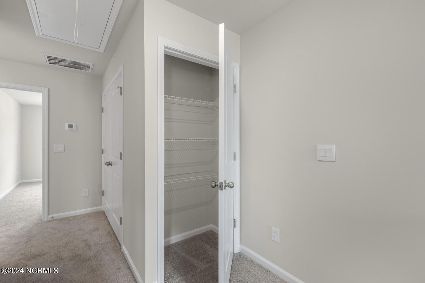 7098 Dunford Road Unit 130, Leland, NC 28451 – photo 13: Storage Closet