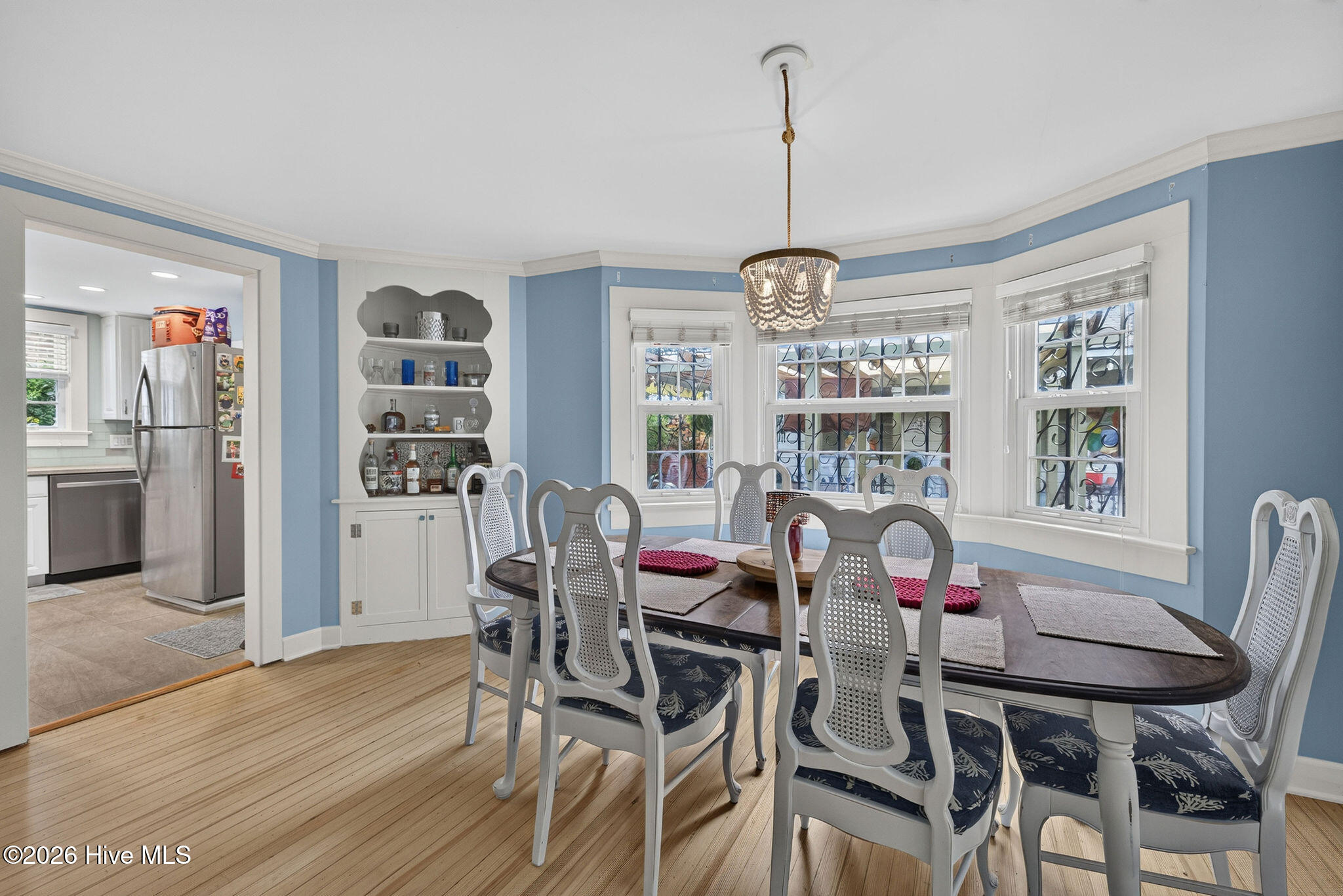 Formal ding room with seamless access to kitchen.