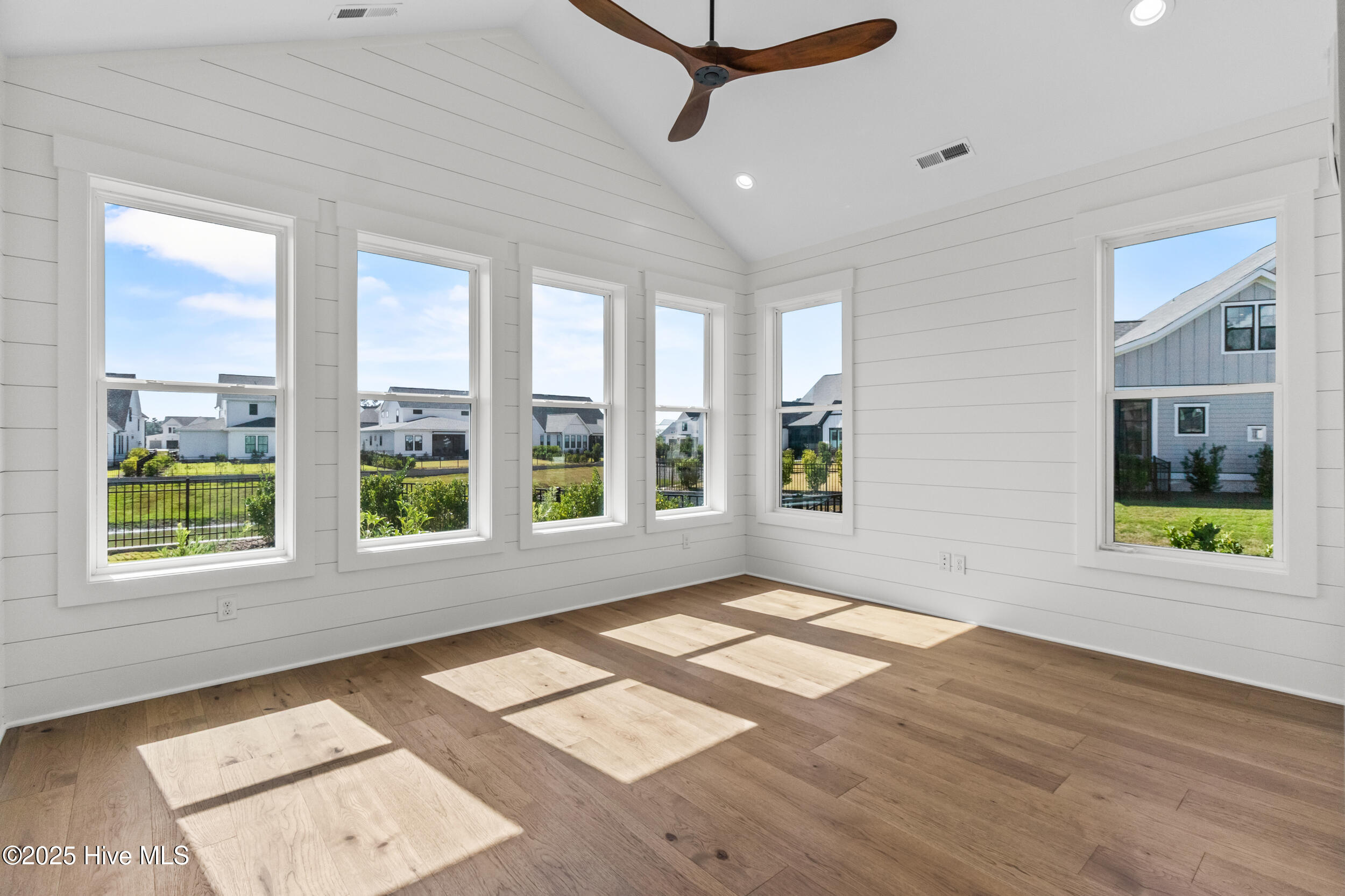 Sitting room with high ceilings and natural light