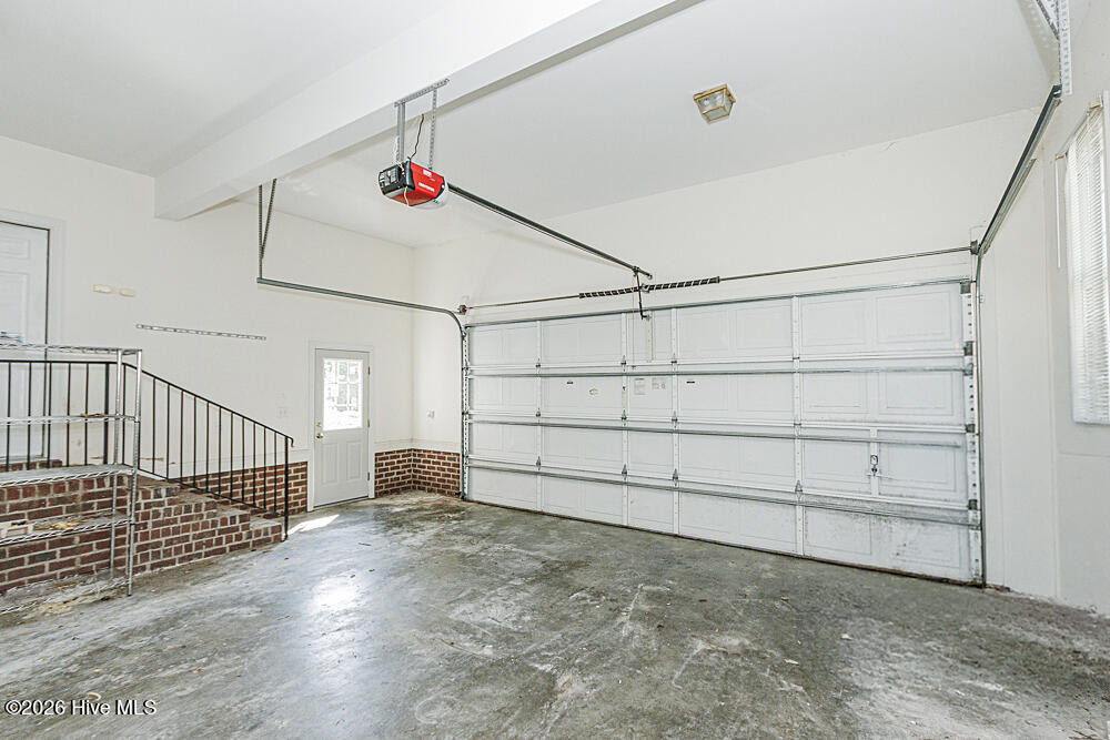Oversized garage with side door