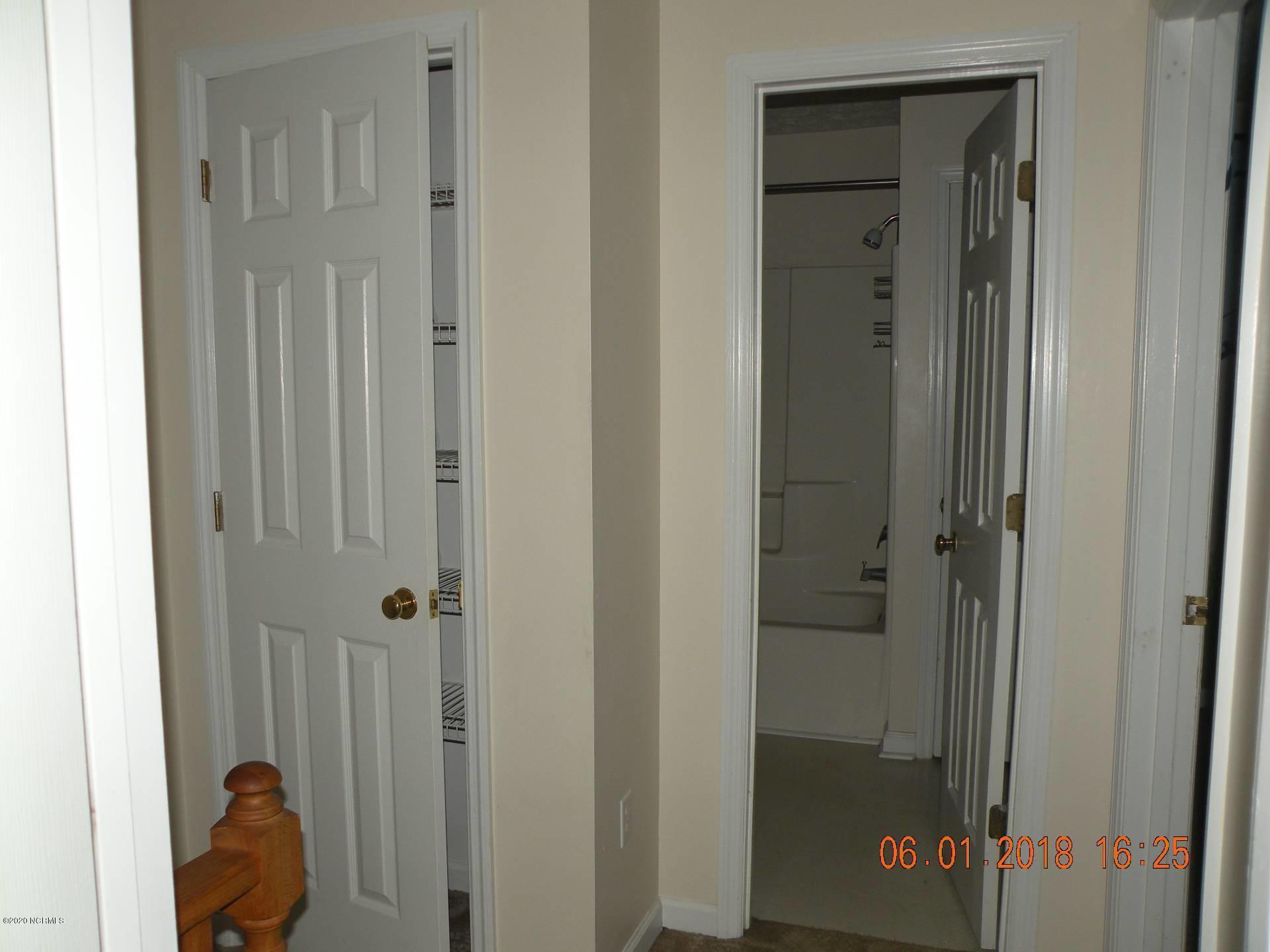 Upstairs hall to bath