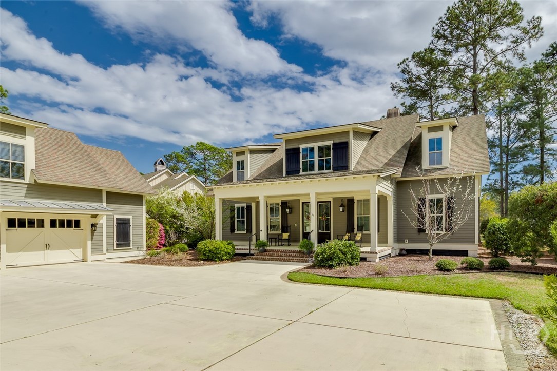 Main house with ample parking and detached garage