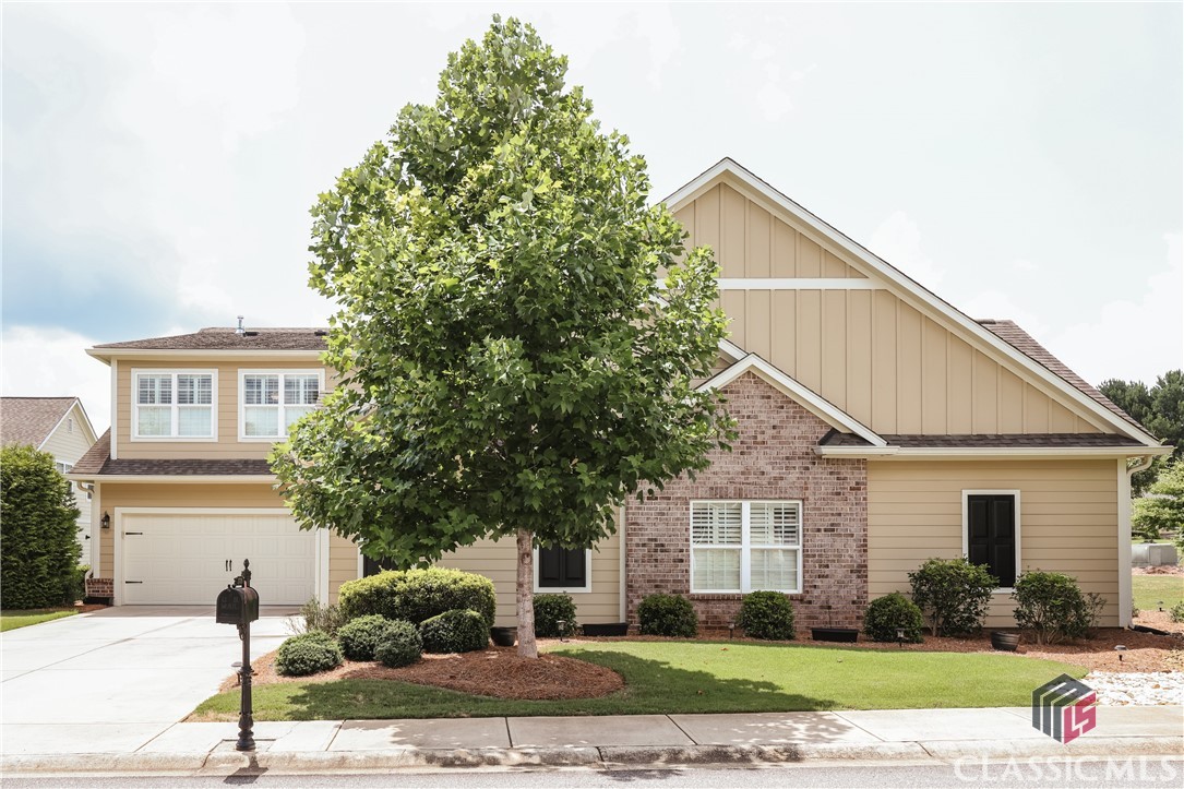 It is rare to find a high end flat that is both elegant, open and handicap accessible. This stunning corner unit will captivate you with its incredible floor plan featuring a dining room, graciously sized living space and large kitchen and breakfast room. The homeowners selected upgrades throughout, including built-in shelving flanking the gas fireplace, a custom backsplash in the kitchen and high end appliances.  Natural light floods the property and the wonderful screen porch is accessible from French doors in the great room.  Located in a premiere location within the complex, the screen porch offers a peaceful space to read and enjoy morning coffee. The open kitchen features a long island with a breakfast bar, custom backsplash, ample cabinetry and a gas range.  A large walk in pantry offers space for not only food items, but overflow of appliances, platter storage and more. A powder room and the laundry room are conveniently located down a wide corridor which leads to the garage entry from the kitchen.The owner's suite is located on the main level along with two secondary bedrooms which share a full hall bath. Tray ceilings accent the owner's suite and the bathroom has a large roll in tile shower with a new frameless glass door. A soaking tub, separate lavatory and enormous walk in closet complete the space.The upper level is accessed by a wide, brightly lit stairwell and offers an oversized bonus room with a full bath, large walk in closet and enough space for both a sitting area and bedroom. Guests will delight in having private guest quarters.3779 Orchard Circle is a rare find located within a well maintained development. Enjoy a clubhouse, pool and exercise facility which is only available to residents of the Orchard Creek Cottage owners. A maintenance free, serene lifestyle awaits you!