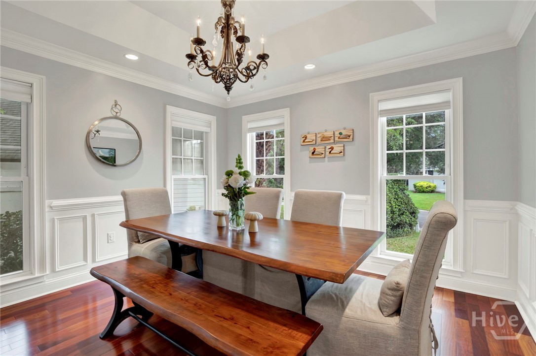 Formal Dining Room with elegant chandelier
