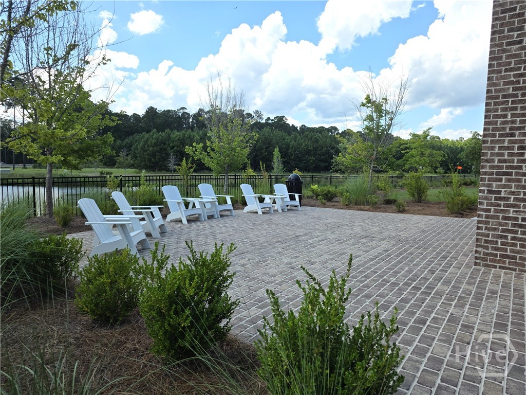 Friends can meet near pool and Outdoor Fireplace