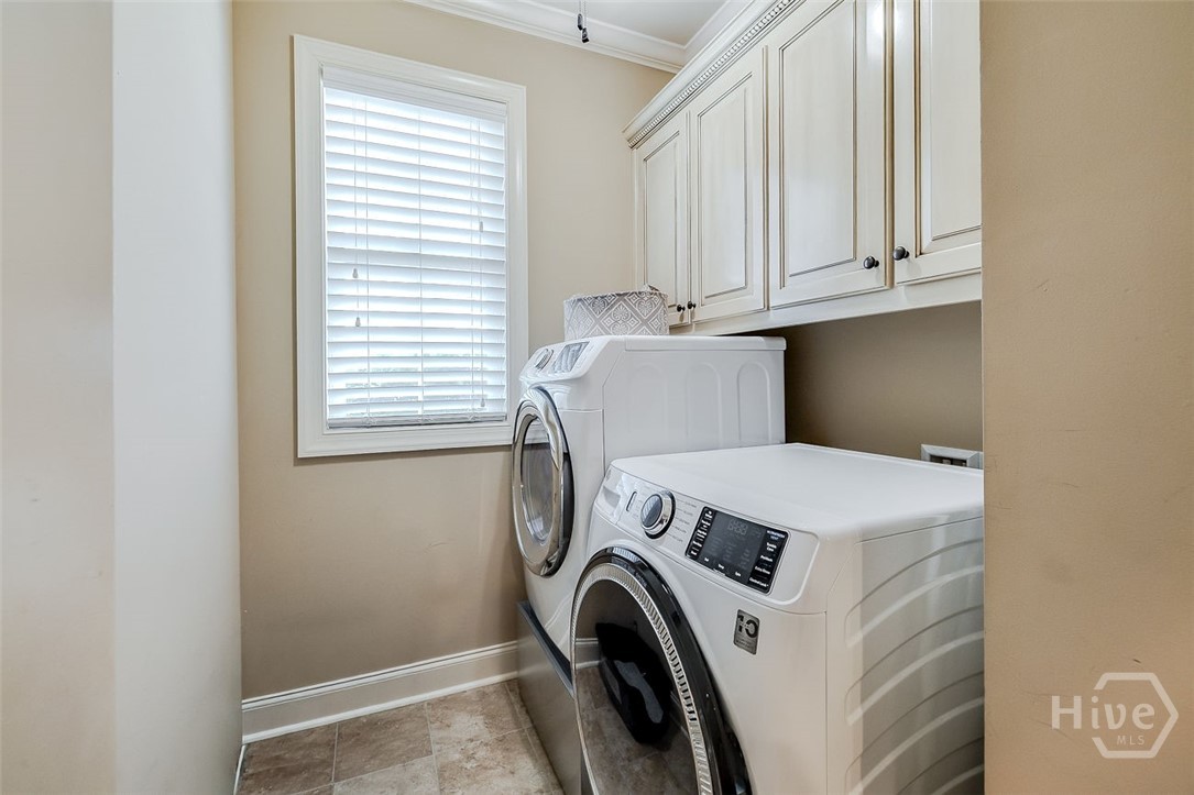 Laundry room with ample storage space