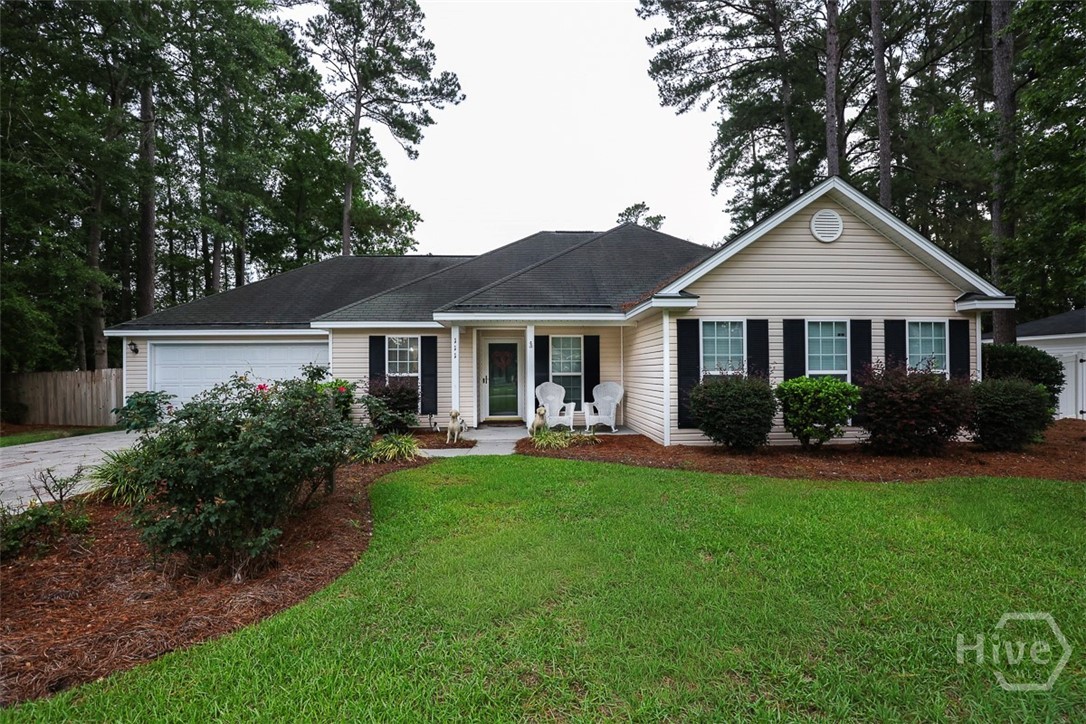 Looking for an affordable 4-bedroom home in Effingham County? This charming Rincon property offers nearly 1,700 square feet of comfortable living space with room for everyone! Inside, you'll find 4 spacious bedrooms and 2 full bathrooms, along with a large living room, formal dining area, and a cozy breakfast nook. The updated kitchen features new cabinetry, countertops, and stainless steel appliances, making it both stylish and functional. Step outside and enjoy the beautifully landscaped front yard, filled with mature plantings and seasonal blooms that create incredible curb appeal. The fully fenced backyard provides privacy and plenty of space for outdoor activities, complete with a patio area perfect for relaxing or entertaining. Additional features include a dedicated laundry room with an adjoining flex space currently used for storage—but easily transformed into a home office, hobby room, or study area. A 2-car garage offers added convenience and storage. This home combines affordability, space, and updates in one of Effingham County's most sought-after communities. Don't miss your opportunity to make it yours!