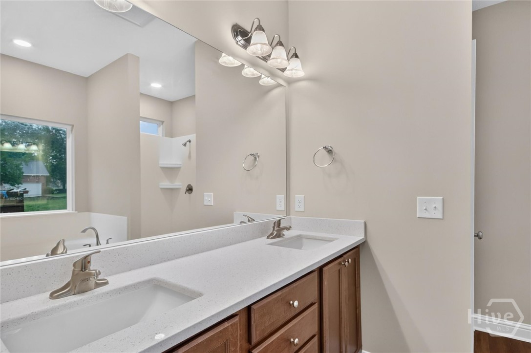 Primary bathroom with dual sink vanity