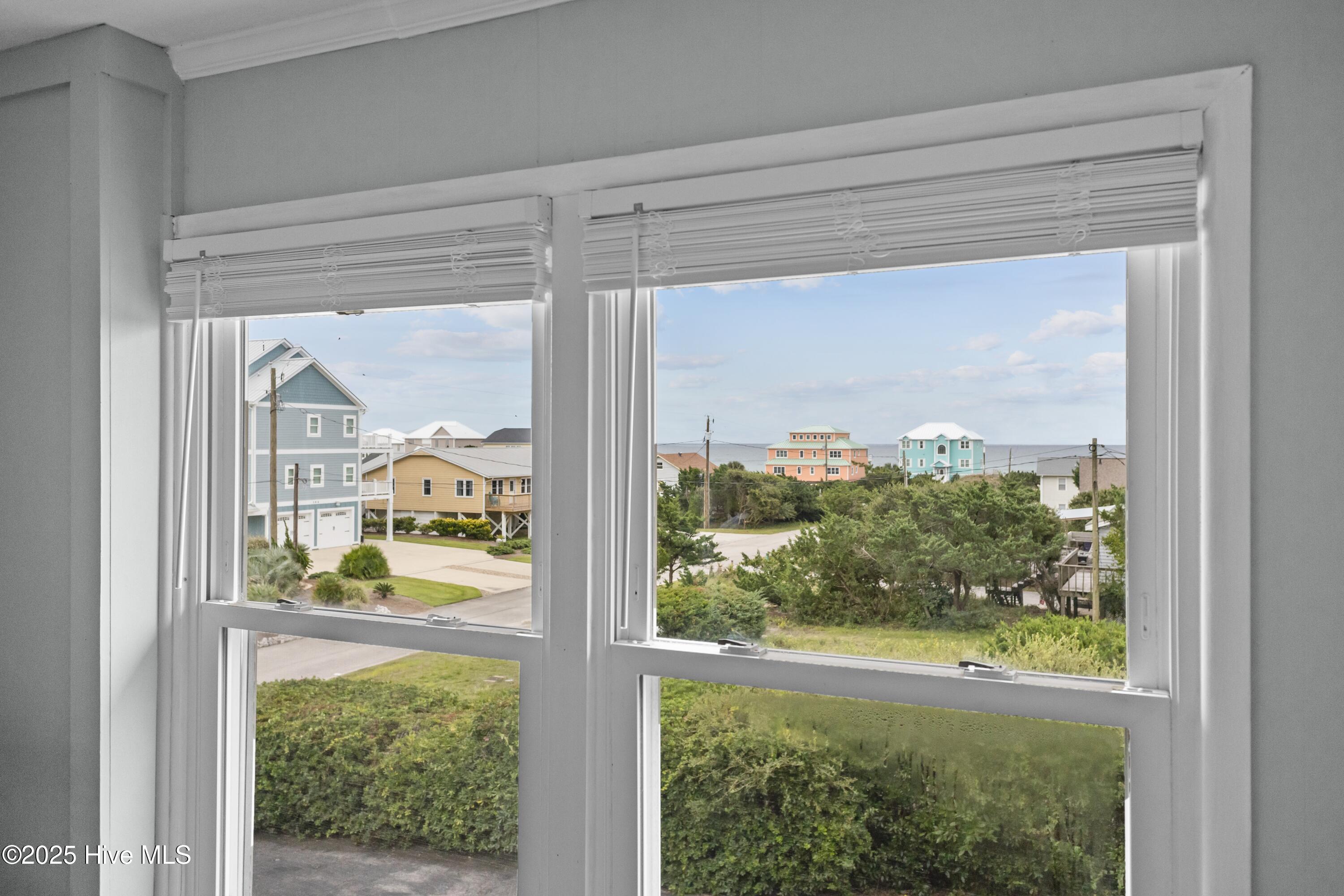 view out living room window with ocean views